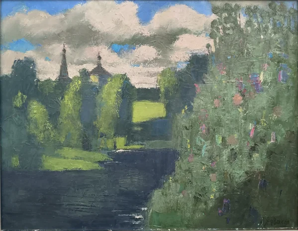 У реки